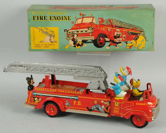Linemar lithographed-tin friction fire engine with Disney characters, accompanied by original box, $3,300. Morphy Auctions image.