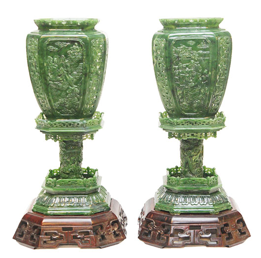 Pair of large spinach jade vase-form reticulated lantern urns, 16 1/2 inches high. Price realized: $22,420. Elite Decorative Arts image.  