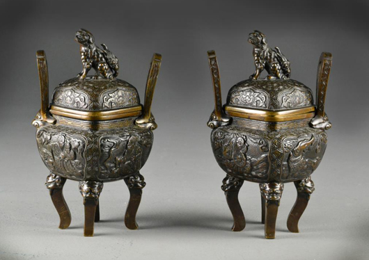 Pair of finely cast Chinese bronze censers and covers. Midwest Antiques Galleries Inc. image.