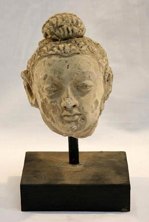 Fourth century Ghandara stucco head. Unique Auctions image.