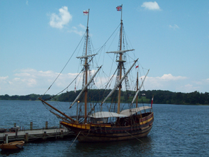 A replica of the ship Dove, which first brought English settlers to Maryland in 1634, is shown docked at historic St. Mary's City. Image by Pubdog, courtesy of Wikimedia Commons.