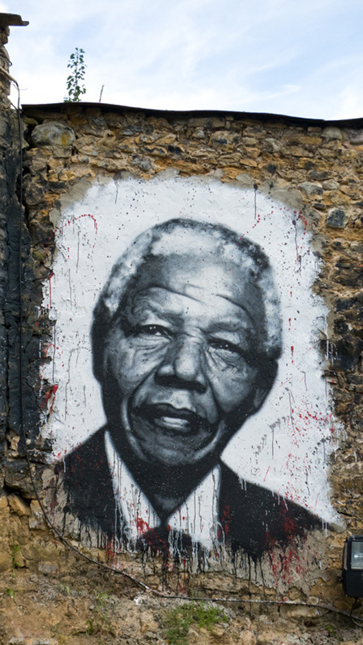 Nelson Mandela has inspired wall art all over the world. This graffiti painting by Thierry Ehrmann is displayed in the Abode of Chaos museum in France. Courtesy of Organ Museum, copyright 2011, licensed under the Creative Commons Attribution 2.0 Generic license.