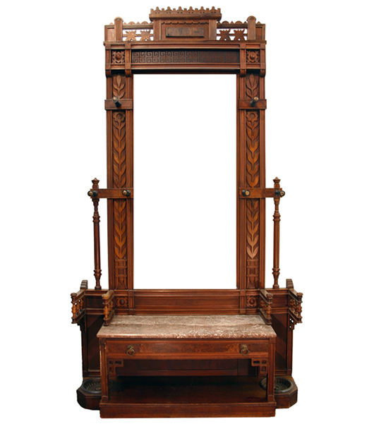 Showing the square outline and profuse linear decoration of the surface, this Eastlake hall stand is from the 1880s.