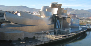 Among the international branches of the Guggenheim is the Frank Gehry-designed Guggenhaim Bilbao, a striking architectural addition to the Spanish city's riverfront. Photo by MykReeve, licensed under the Creative Commons Attribution-Share Alike 3.0 Unported license.
