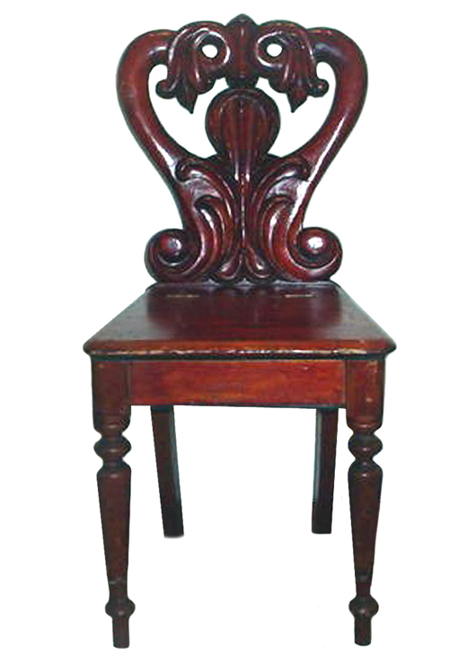 This plank-bottom chair with a lift seat for storage is typical of the 'guest' seating found in Victorian period halls.