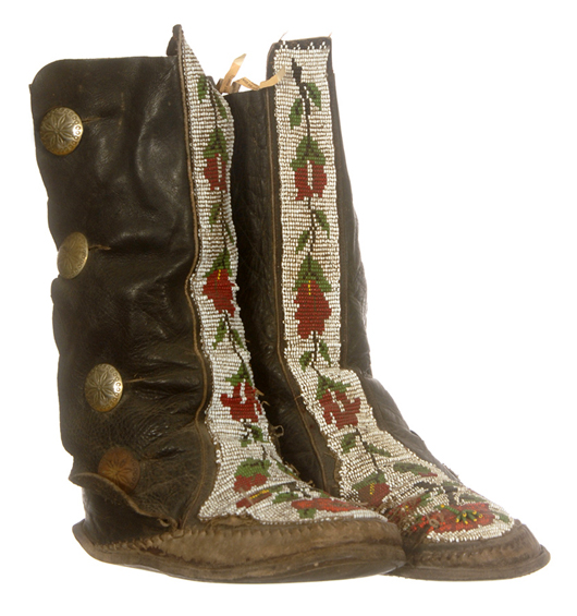 Pair of 12-inch-tall Indian beaded leather boots, in overall nice condition, some bead damage. Woody Auction image.