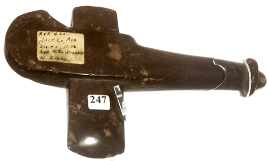 Prehistoric smooth stone ceremonial ax (found in Hale Cty., Ala., 1936), 11 inches by 7 inches. Woody Auction image.