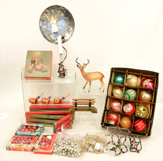 Assortment of vintage Christmas decorations including glass ornaments, garlands, etc. Stephenson’s image.