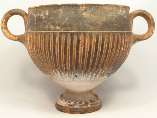 Greek footed cup, Magna Graecia, circa fourth century B.C., 4 inches high. Ancient Resource Auctions image.