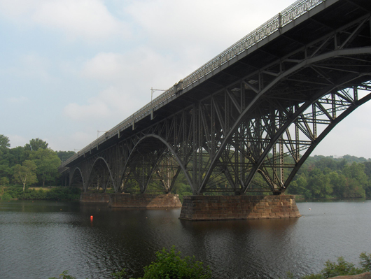 The Strawberry Mansion Bridge, built 1896-97, is a steel arch bridge across the Schuylkill River in Fairmount Park in Philadelphia. Image by Davidt8, courtesy of Wikimedia Commons.