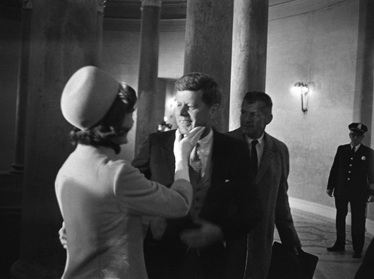 First Lady Jacqueline Kennedy gives her husband a tap under the chin moments after he was sworn in as president. Henry Burroughs/AP. Washington, D.C./January 1961.