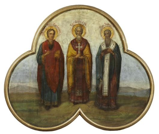 Unusual and large 18th century Russian icon panel of three saints, in rounded edge trefoil frame. Crescent City Auction Gallery LLC image.
