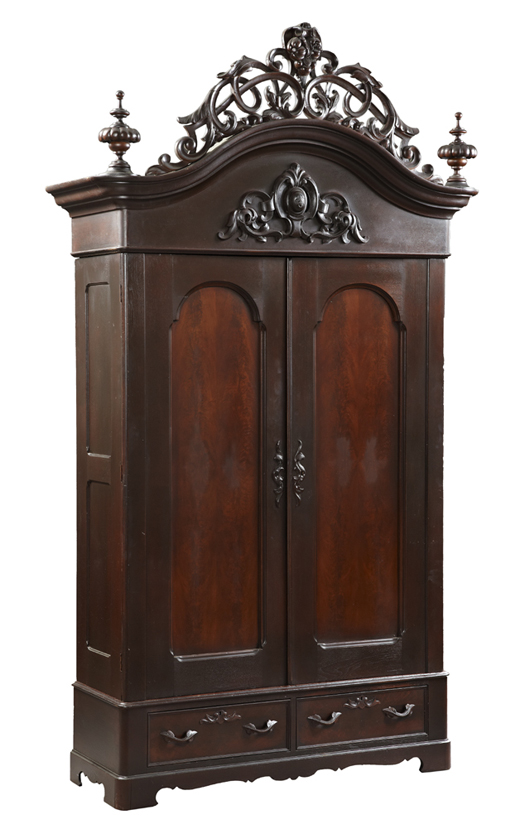 American carved walnut double-door armoire, circa 1860, probably Mitchell & Rammelsberg. Crescent City Auction Gallery LLC image.