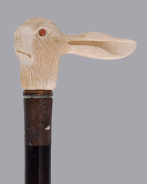 A carved ivory and brass mounted stained hardwood walking stick, late 19th century, the grip modeled as the head of a hare. Estimate: £200-£300. Dreweatts and Bloomsbury Auctions image.