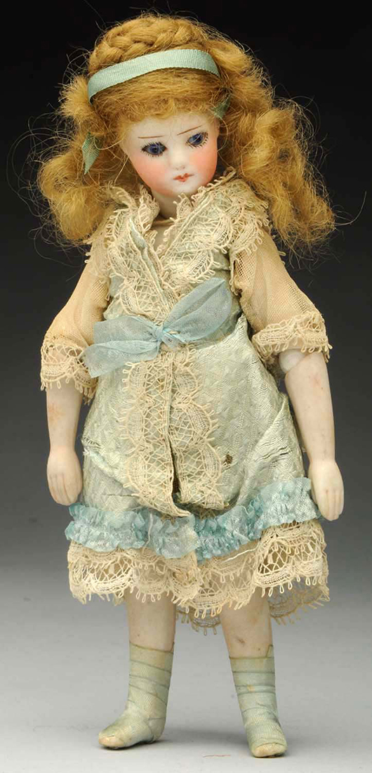 French bisque mignonette doll, circa 1877, 5½ in tall, est. $2,500-$3,500. Morphy Auctions image.