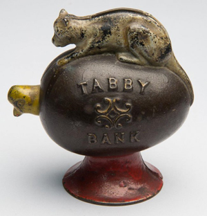 Tabby cast-iron mechanical bank, embossed ‘Tabby Bank’ with nodding chick, original paint, by J. & E. Stevens & Co., fourth quarter 19th century, 4 1/2 inches high. Price realized: $5,750 against $300-$500 estimate. Jeffrey S. Evans & Associates image.
