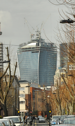 This picture of the 'walkie talkie' building at 20 Fenchurch, London, was taken in April 2013, when the building was still under construction, and shows its unusual, flared shape. Photo by Eluveltie, licensed under the Creative Commons Attribution-Share Alike 3.0 Unported license.