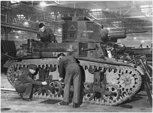 Fitters prepare an M2A4 light tank that has just arrived at a British ordnance depot. Image courtesy of Wikimedia Commons.