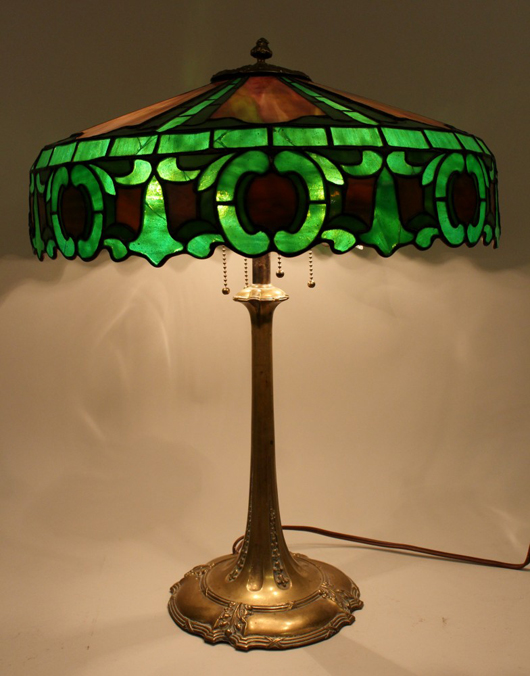 Gorgeous early 20th century Duffner & Kimberly table lamp with stained and leaded glass shade. Price realized: $3,835. Ahlers & Ogletree image.