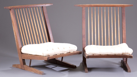 George Nakashima (Japanese/American, 1905-1990), pair of Conoid Cushion Chairs, black walnut with hickory spindles, original upholstery, est. $8,000-$15,000. Quinn & Farmer image.