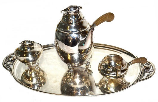 Lot 541 – Georg Jensen sterling coffee service. Roland Auction image.