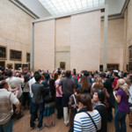 A crowd views the Mona Lisa at the Louvre, which has been plagued recently by pickpocketers. Image by Pueri Jason Scott. This file is licensed under the Creative Commons Attribution-Share Alike 3.0 Unported license.