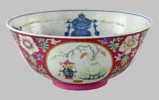 Chinese Famille Rose pink ground medallion bowl, the exterior with four circular cartouches of auspicious objects. Estimate: £1,000-£1,500. Ewbank’s image.