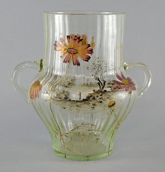 Emile Galle 1846-1904, an early enameled glass vase, painted landscape figure by a lake and flowers, signed Emile Galle, Fecit. Estimate: £800-1,200. Ewbank’s image.