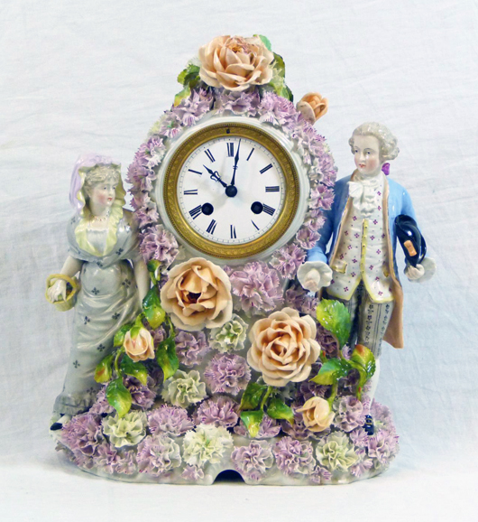Sitzendorf German porcelain figural mantle clock with Lenzkirch movement, made circa 1865 (est. $5,000-$7,000).
