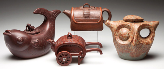 Selection of Chinese contemporary zisha clay teapots, from a group of over 100 in the auction. Jeffrey S. Evans & Associates image.