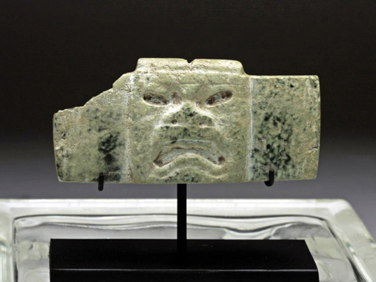 Pre-Columbian Olmec carved jadeite or green hardstone plaque, Mexico, Mayan territories; circa 1150-550 BC. Estimate $3,000-$4,500. Antiquities Saleroom image.