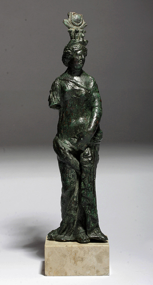Roman bronze Isis-Aphrodite figure, 1st century BC, 8¾ in, custom marble stand. Estimate $18,000-$25,000. Antiquities Saleroom image.