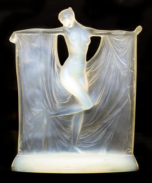 Rene Lalique molded opalescent glass statuette titled Suzanne, 9 inches tall, circa 1920s. Estimate: $20,000-$30,000. A.B. Levy’s image.