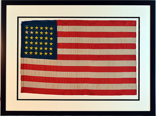Civil War national colors flag, made circa 1864 by Tiffany & Co. for the U.S. Army, 24 inches by 37 inches. Ahlers & Ogletree image.