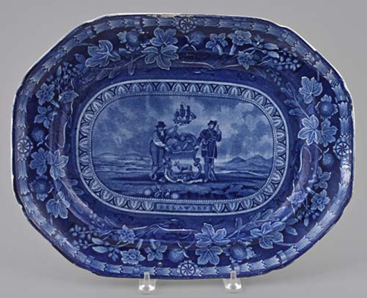 Arms of Delaware platter with blue eagle mark on the underside. Estimate: $3,000- $4,000. Pook & Pook Inc. image.