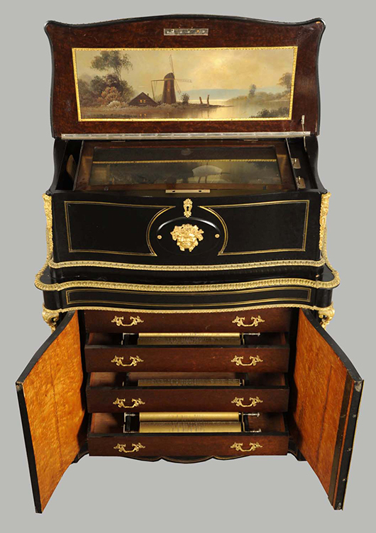 Interchangeable 7-cylinder organ box with ebony case, brass trim, custom made for royalty. Est. $25,000-$30,000. Morphy Auctions image.