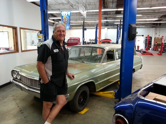 Bob Esler of Bob's Garage in Westfield, Ind., with the four-door 1964 Bel Air station wagon he bought at the auction. It has only 326 miles on the odometer. Bob's Garage image.