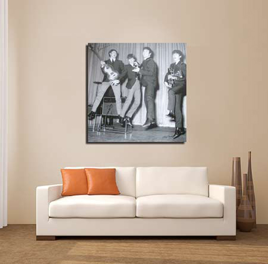 Large Beatles photographic canvas signed by Paul McCartney and producer George Martin. Chaucer Auctions image.