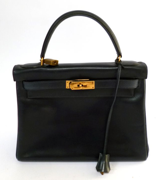 Duke’s, the Dorchester auction house, will be holding a sale of vintage clothing and accessories on Oct. 15 to include this Hermès Kelly bag with its original lock and key. It is estimated at £800-£1,600 ($1,300-$2,500). Image courtesy of Duke’s.