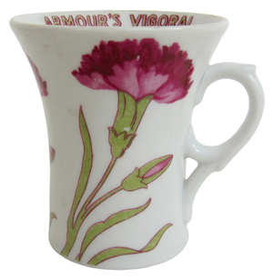 Look online or in an antiques shop for a porcelain cup like this advertising premium for Armour bouillon. It was made in about 1915 and sells for $20-$25.