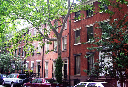 Within the Lower Manhattan neighborhood known as Hudson Square, or West SoHo, is the landmarked Charlton-King-Vandam Historic District, which contains the largest concentration of Federalist and Greek Revival style row houses built during the first half of the 19th century. These circa-1820 houses are located on Charlton Street. Photo by Beyond My Ken, licensed under the Creative Commons Attribution-Share Alike 3.0 Unported, 2.5 Generic, 2.0 Generic and 1.0 Generic license.