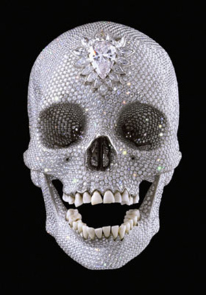Damien Hirst (English, b. 1965-), 'For the Love of God,' platinum cast of a human skull covered with 8,601 diamonds. Featured in Hirst's Qatar exhibition titled 'Relics.' Fair use of low-resolution image under terms noted in Section 107 of US Copyright Act of 1976. Artwork copyright Damien Hirst.