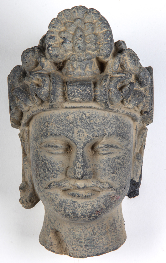 Gray schist head of a bodhisattva, Gandhara, second-third century, 8 x 5 x 6 inches (20 x 13 x 15 cm). Estimate: $800-$1,200. Material Culture image.