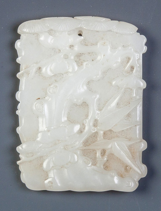 Antique Chinese carved jade plaque with trees and foliage. Price realized: $39,100. Cottone Auctions image.