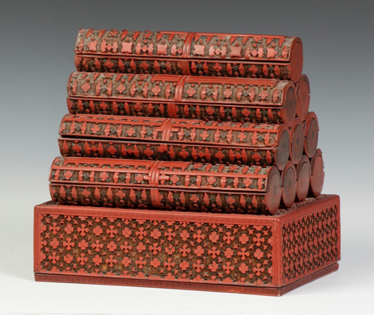 The Asian objects category featured this 19th century Chinese red lacquer cinnabar scroll case. Price realized: $39,100. Cottone Auctions image.