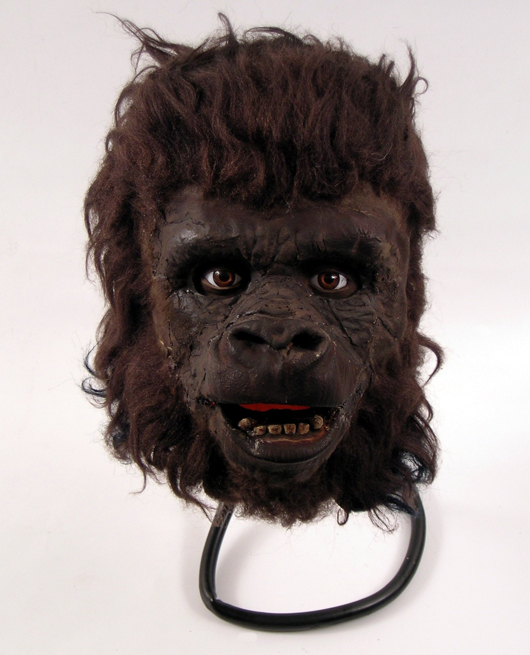 Rare screen-worn background gorilla horse solider latex headpiece from the original ‘Planet Of the Apes’ (1968). Complete with the original applied eyes, teeth and hair. Premiere Props image.