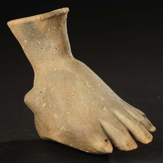 Foot effigy bottle, one of the rarest forms of Mississippian, Southern Cult iconography and one of only three examples found by Mississippian pottery authority Roy Hathcock in a lifetime of collecting. Est. $7,000-$10,000. Morphy Auctions image.