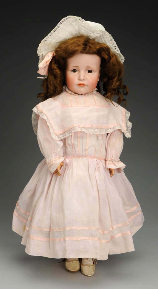 21in K & R 114 character doll with rare glass eyes, $9,000. Morphy Auctions image.