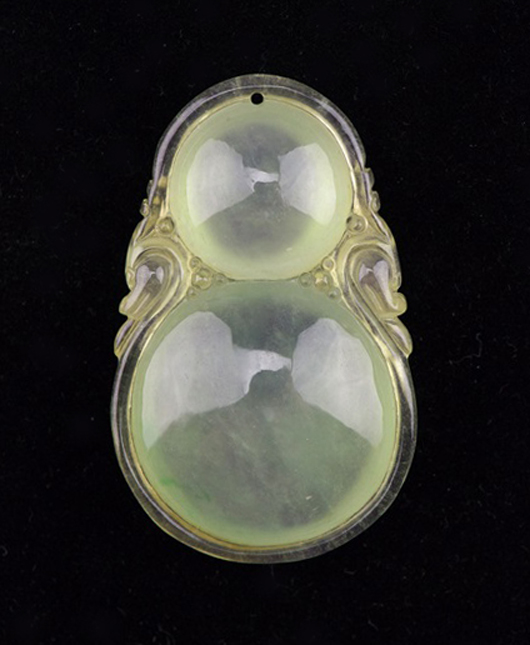 Lot 150: Chinese icy jadeite double dragon pendant. Estimate: $800-$1,600. 888 Auctions image.