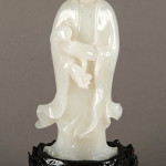 Lot 202A: fine Chinese white jade carved Kwanyin statue. Estimate: $2,500-$4,500. 888 Auctions image.